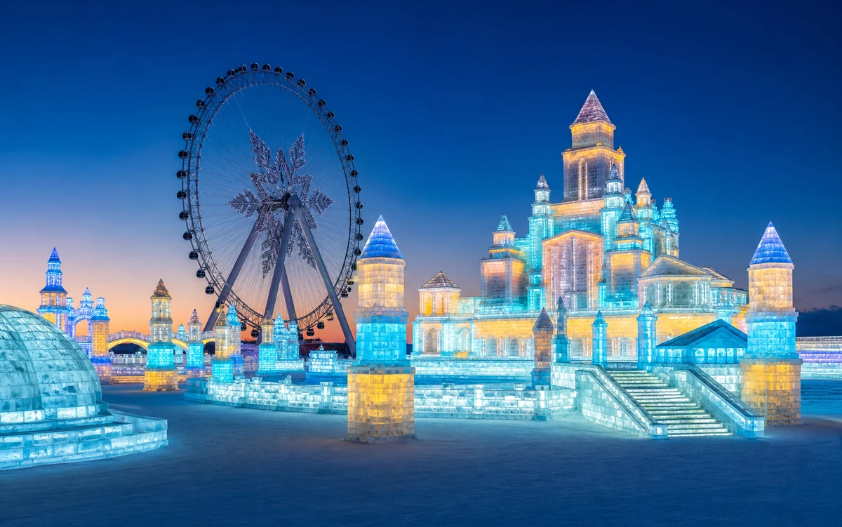 Harbin Ice and Snow World glowing beside its landmark ferris wheel